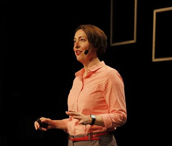 Ingrid Pope standing on a stage