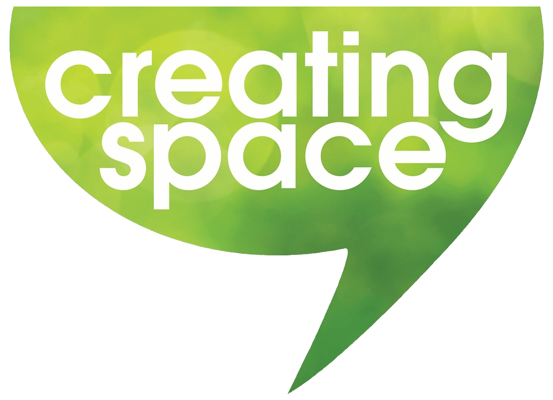 Cropped green speech bubble with white text "Creating Space" inside