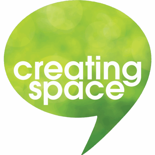 Green speech bubble with white text "Creating Space" inside